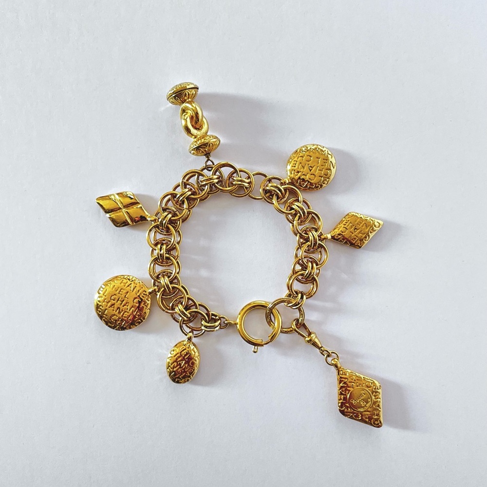 Chanel Vintage Mademoiselle 24k gold plated Charm Bracelet. 1980’s. EUC.